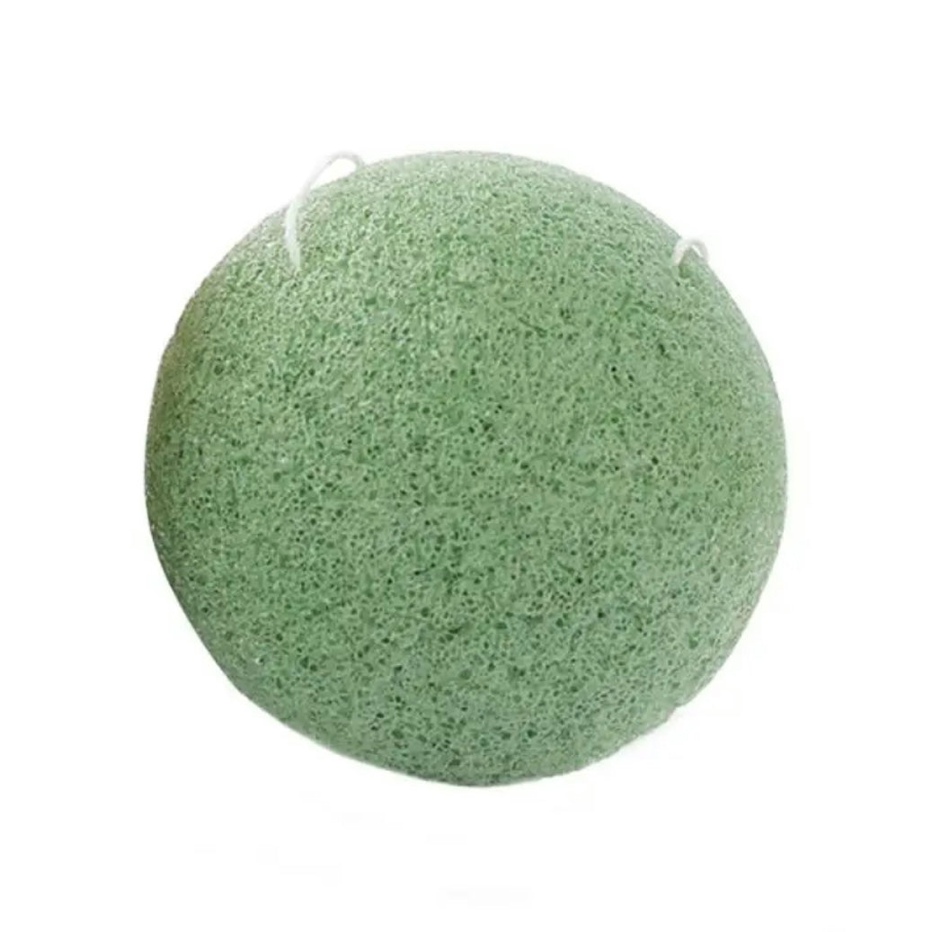 A green Bristolmade Konjac sponge, slightly rounded and porus in texture, designed for gentel exfoliation and made with natural plant fibres.
