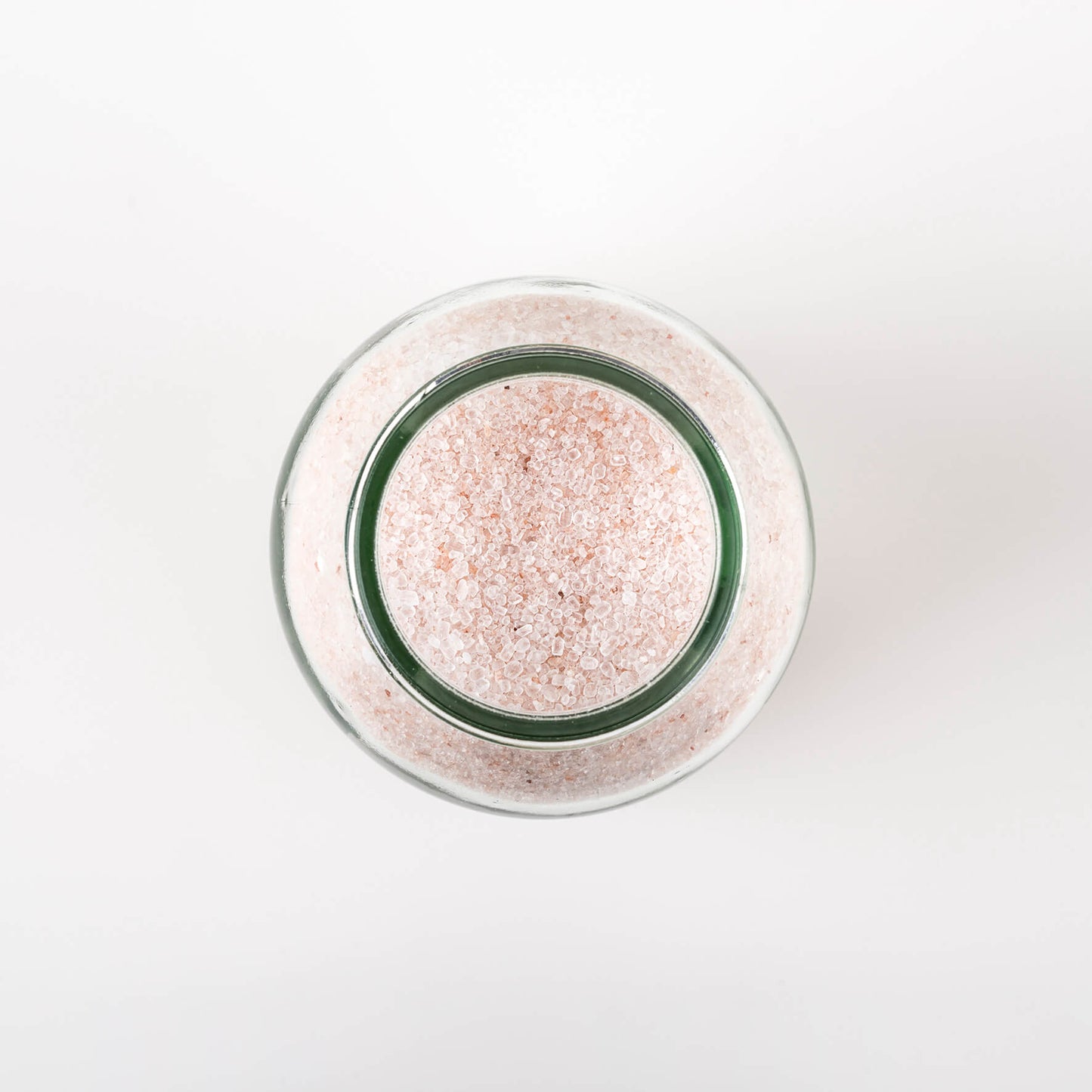 The top view of Bristolmade Cleansing Bath Salts, showing the pale pink grains of Himalayan and Epsom salts.