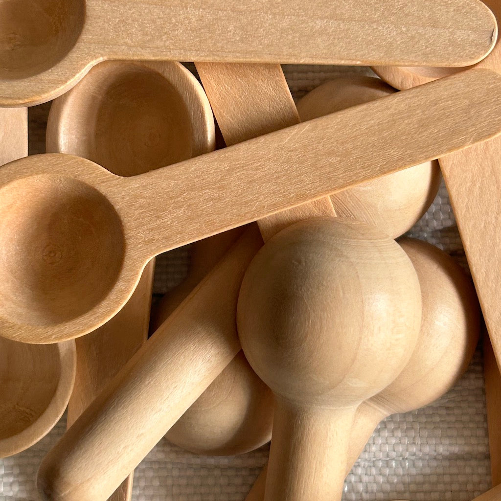 photo of small bamboo spoons that can be used with the powder cleanser.