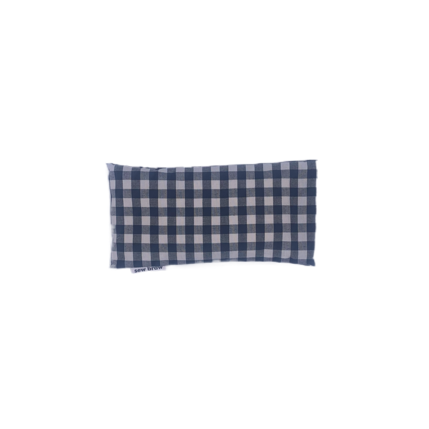 Photo of a black and white check cotton eye pillow on a white background.